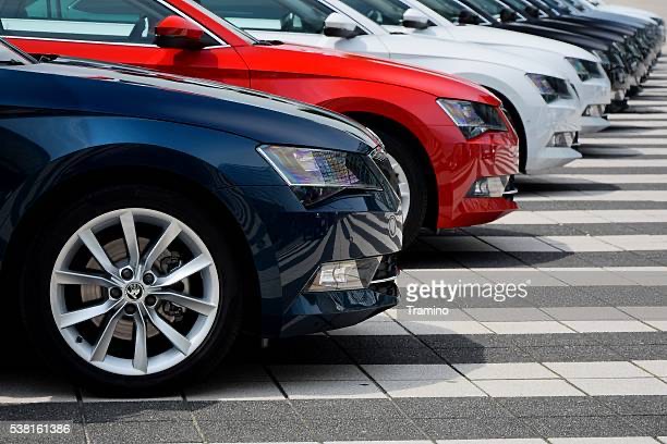 Munich, Germany - 3rd July, 2015: Skoda Superb cars stopped on the parking during the press launch. The first generation of Superb was debut in 2001 on the market. The third generation of luxury liftback from Skoda is powered by diesel or petrol engines (pushing out 110-280 HP). The Superb is the most luxury car in Skoda offer.